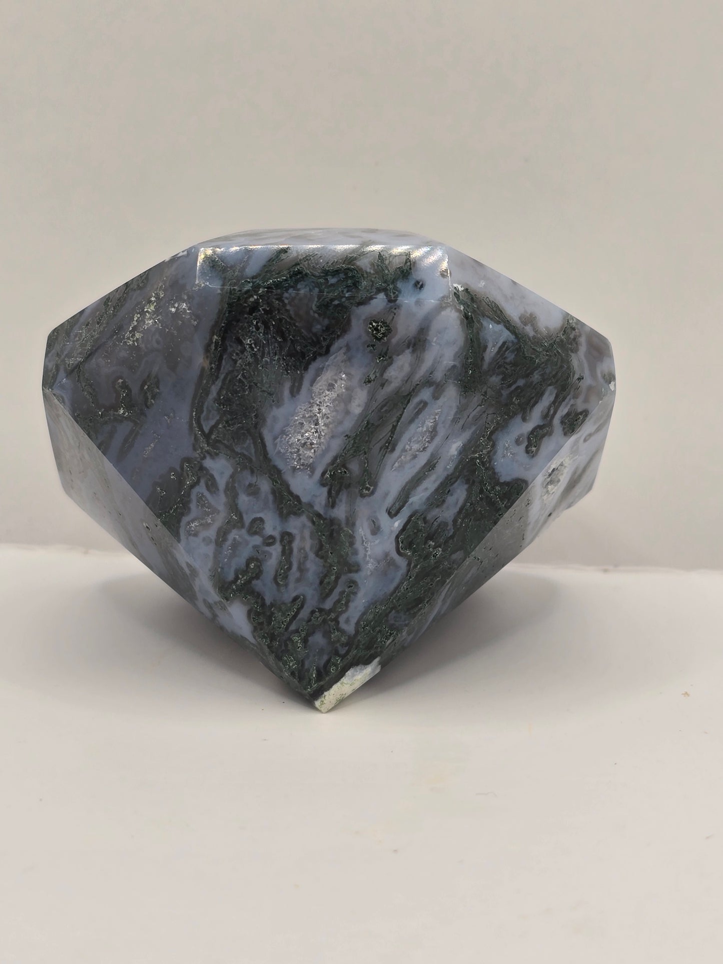 Mosagaat kristal met druzy